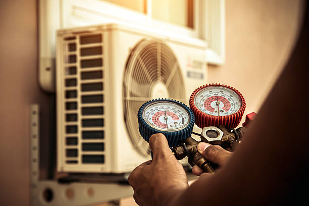 Professional Air Conditioning Service technician working in Olivia, NC